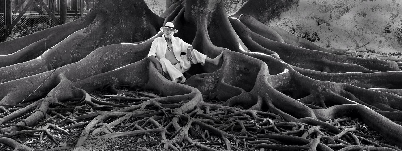 Jerry Diakiw, almost hidden by tree roots